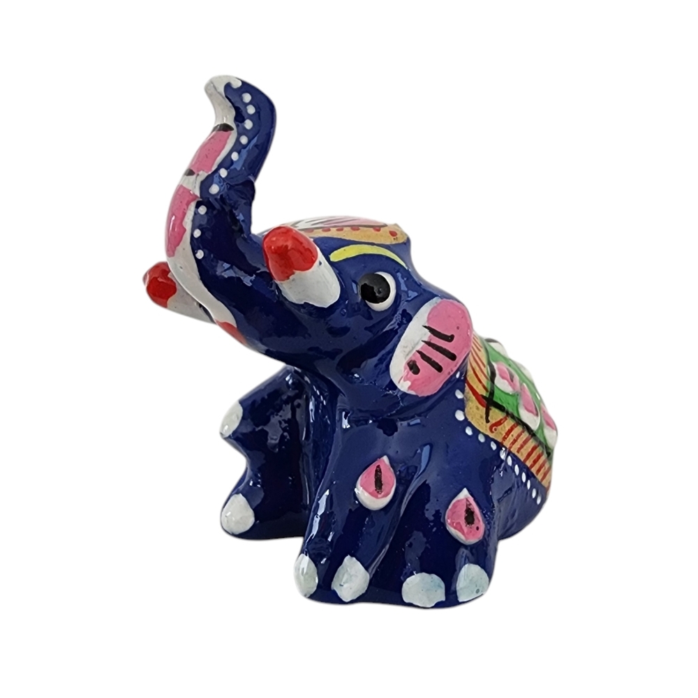 Sitting elephant figurine hand painted artisan made cast metal green on blue